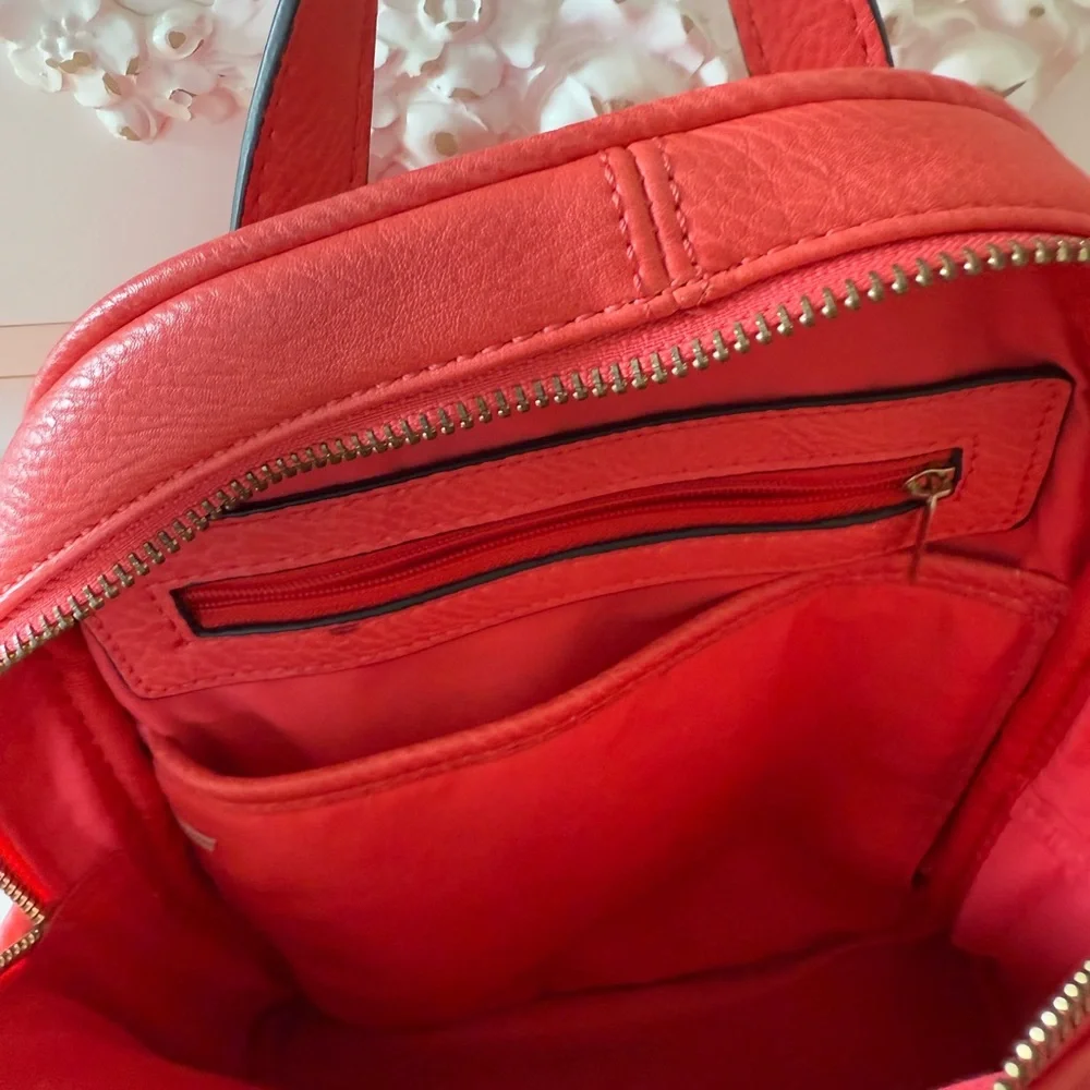 Salmon colored Real Italian leather mini backpack with gold hardware
